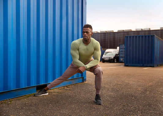Athlete training outdoors for a beginner hybrid running and lifting program